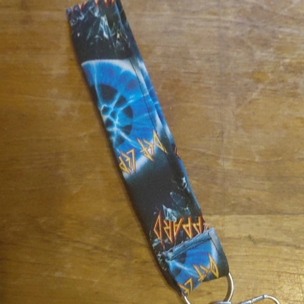 Blue and Black Keychain with Graphic Design